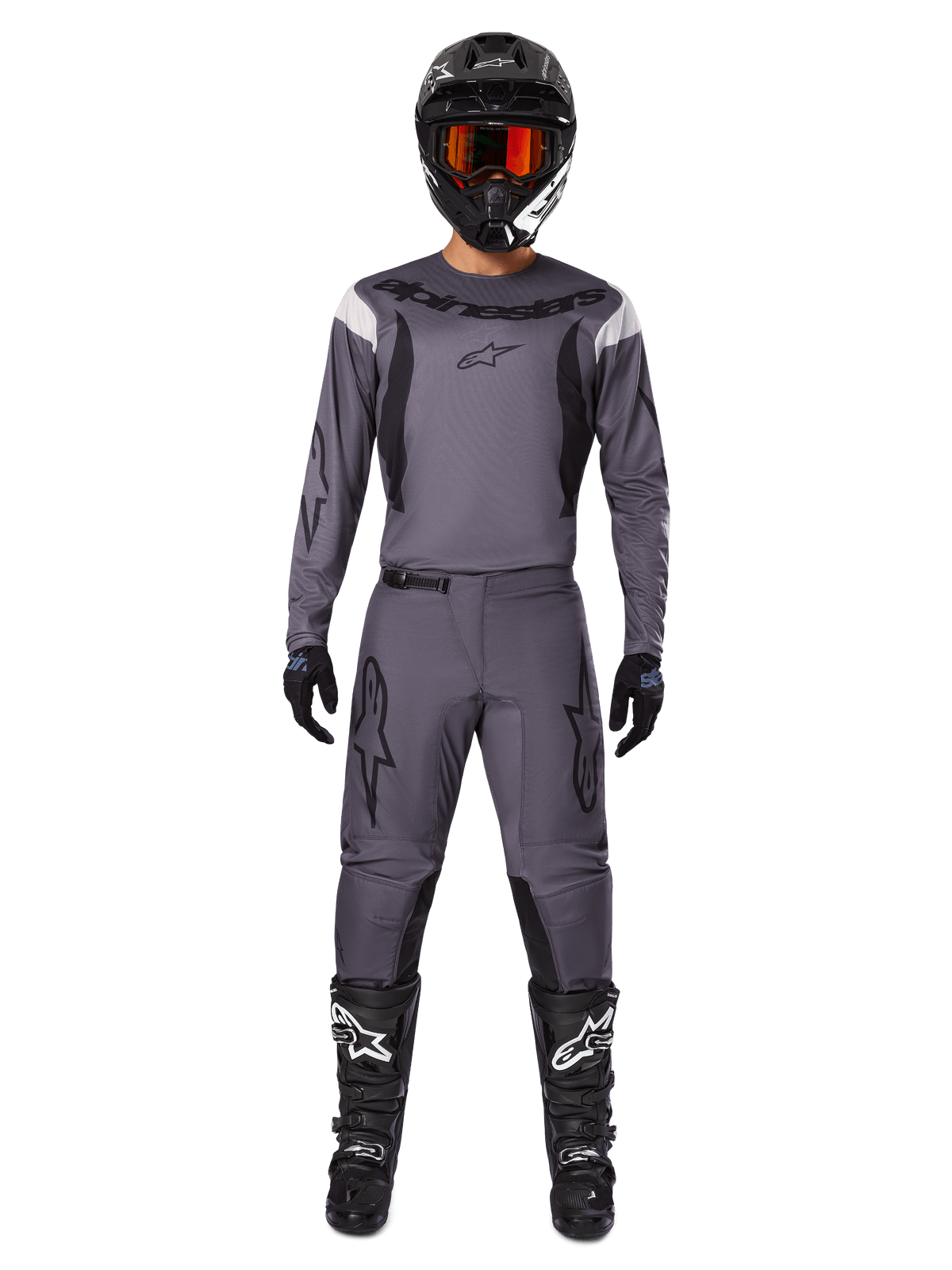 Alpinestars 2025 Fluid Haul utrustningsset, motocrossutrustning, grått, grå tröja och byxor med svarta detaljer, svart hjälm med orange goggles, svarta stövlar med vita logotyper, koordinerad racingoutfit för terrängkörning