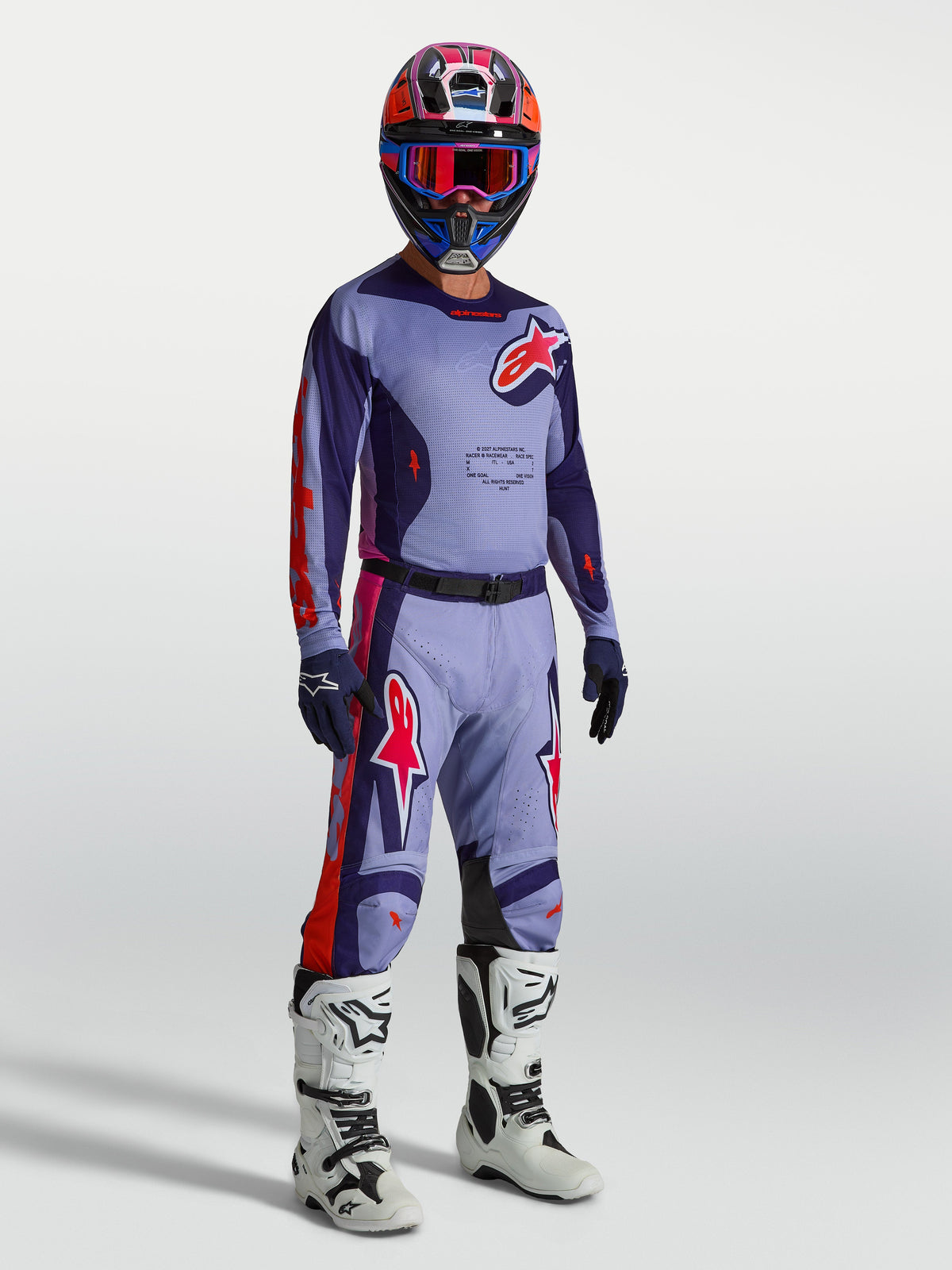 Alpinestars 2027 Racer Air Hunt Gear Set, purple and red motocross gear with ventilated jersey, pants, and white boots.