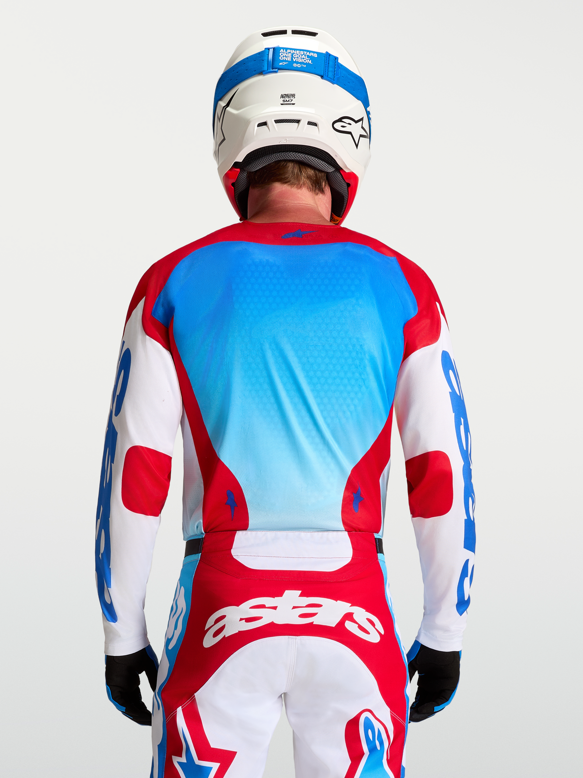 Alpinestars Racer Hunt tröja, röd och blå motocrosströja för herr, andningsbart material, vy bakifrån på modell