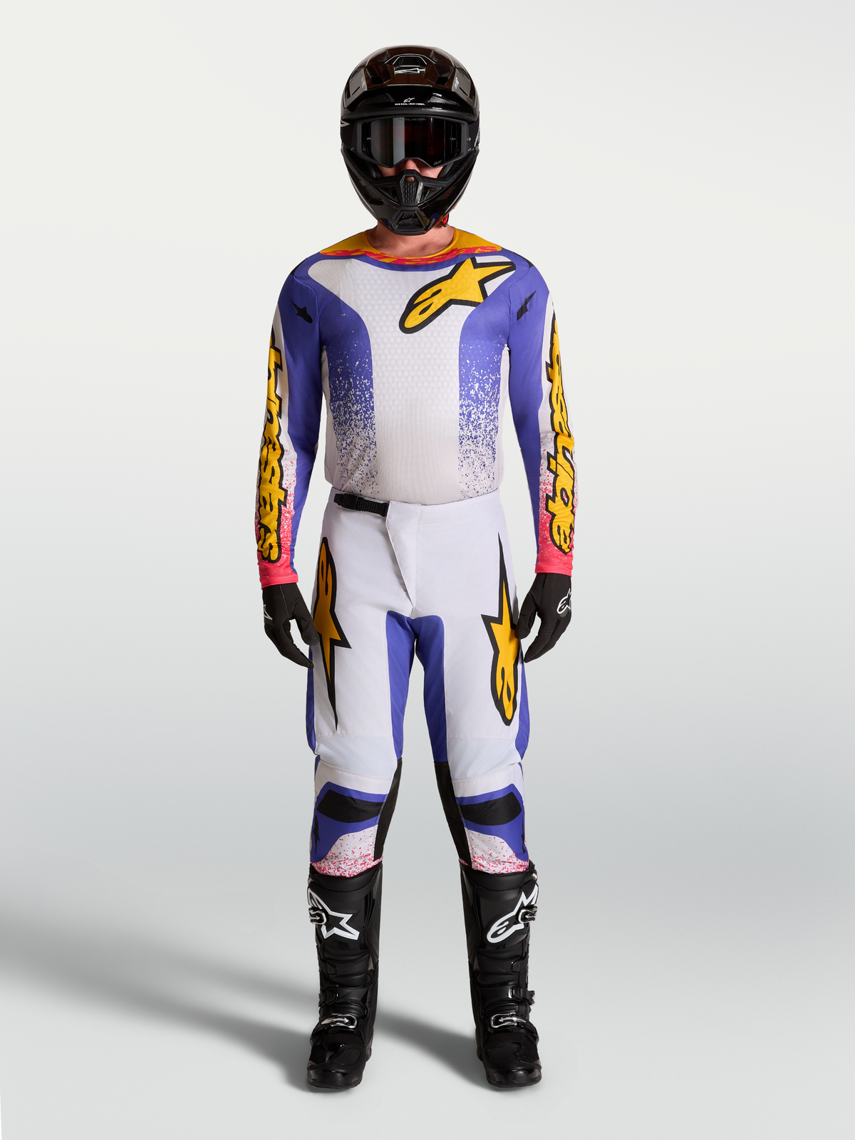 Alpinestars Fluid Drag Jersey and Gear Set, men's motocross outfit in blue and gold with ergonomic stretch textile.