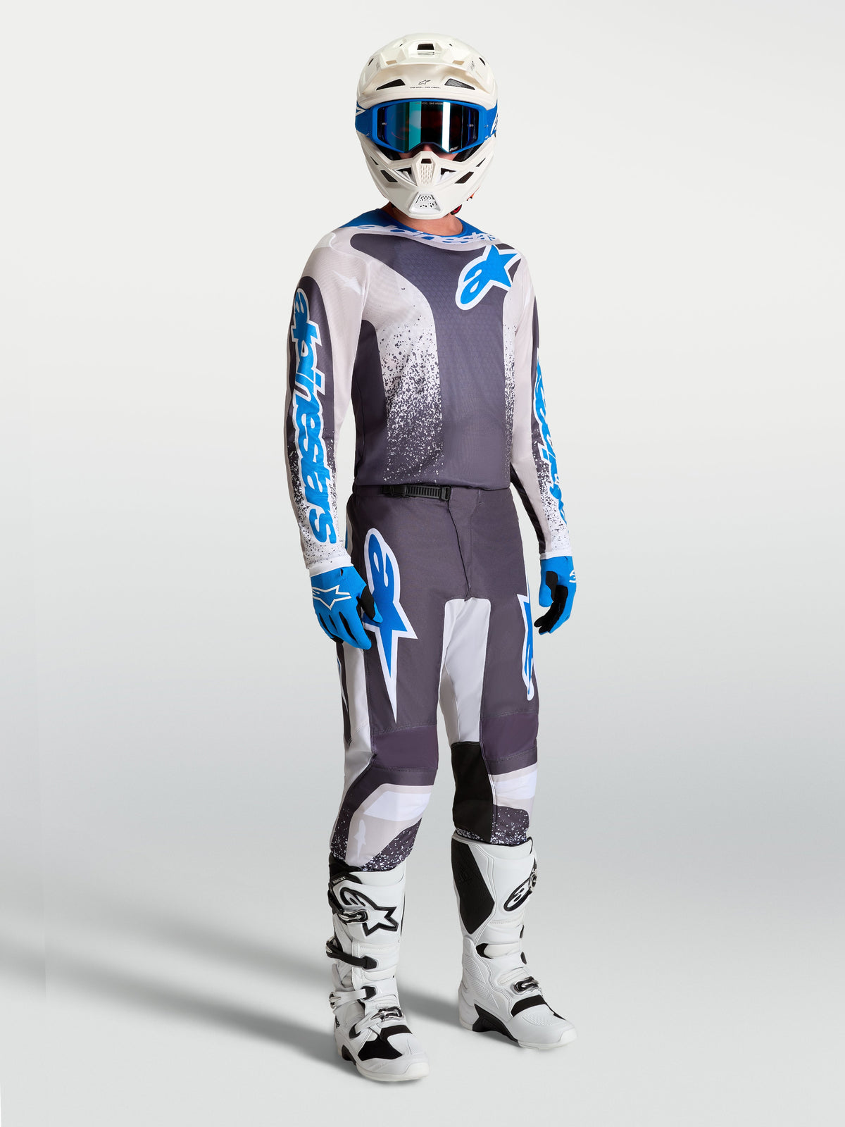 Alpinestars 2027 Fluid Drag Gear Set, Men's gray and blue motocross racing outfit featuring matching jersey and pants.