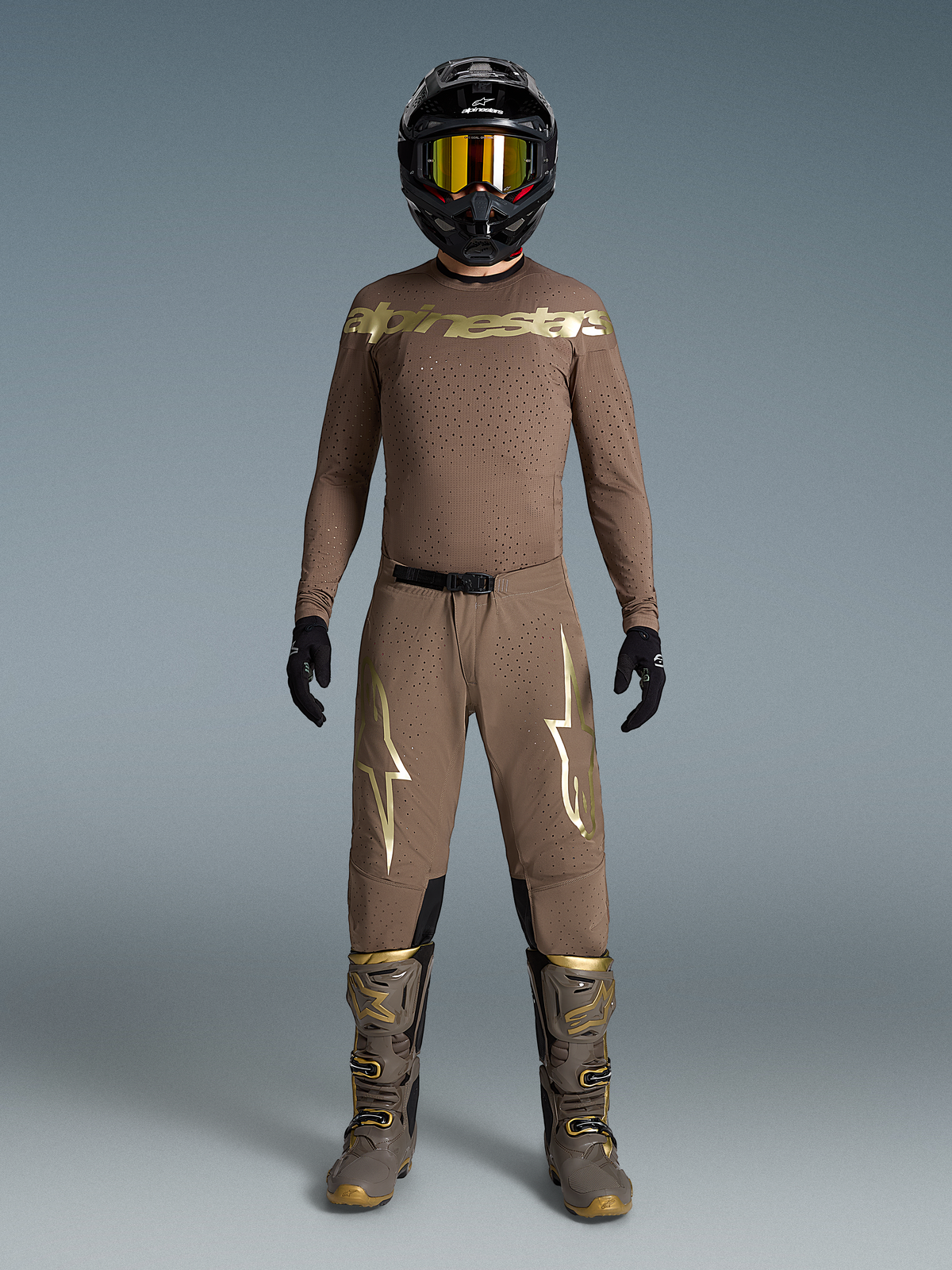 Alpinestars Limited Edition Supertech Air Gold Motocross Gear Set in Brown and Gold with ventilated mesh and athletic fit.