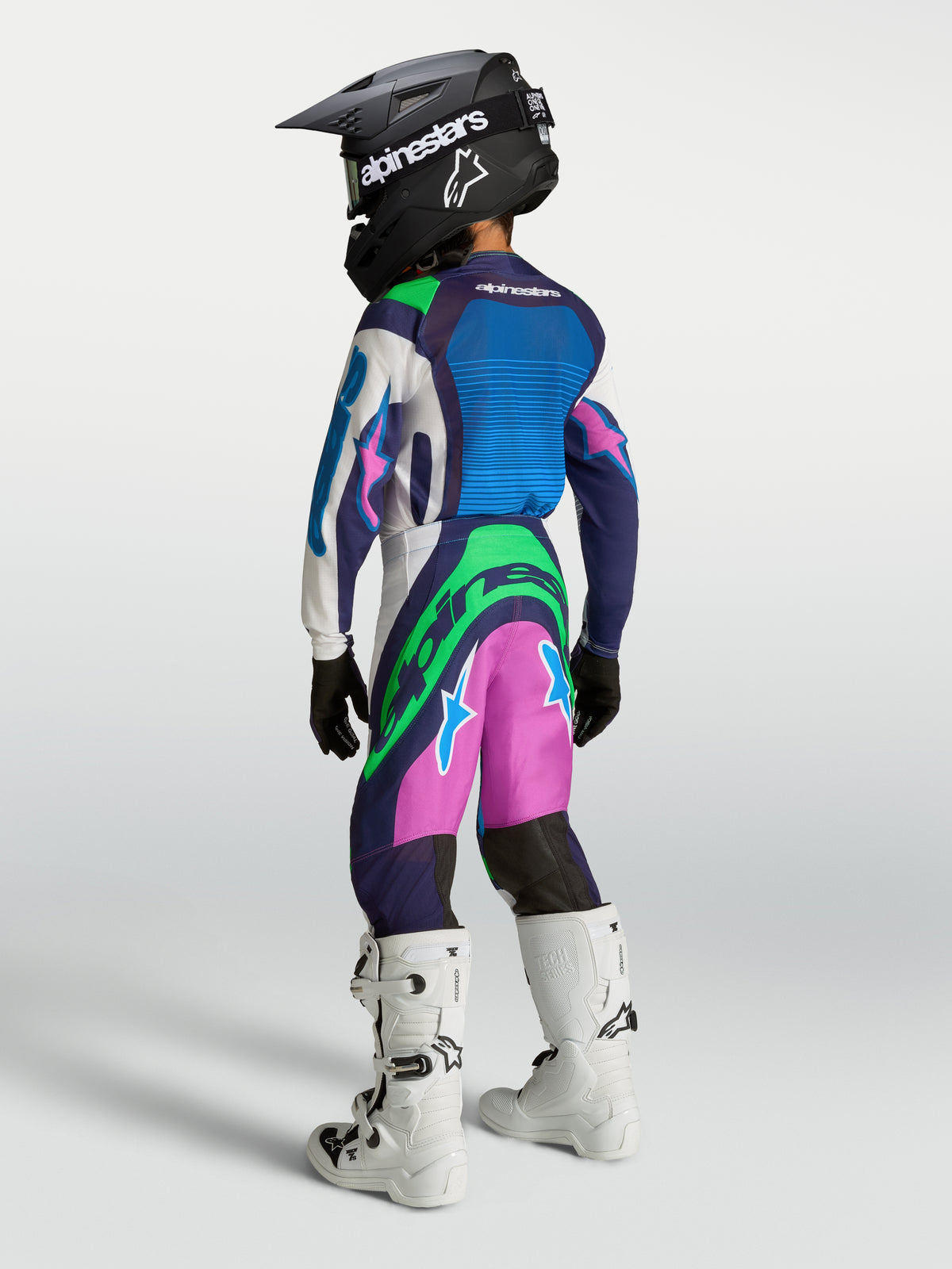 Alpinestars 2027 Youth Supertech Maven Jersey and Gear Set, Youth Motocross, Blue and Green Fluo, rear view athletic fit.