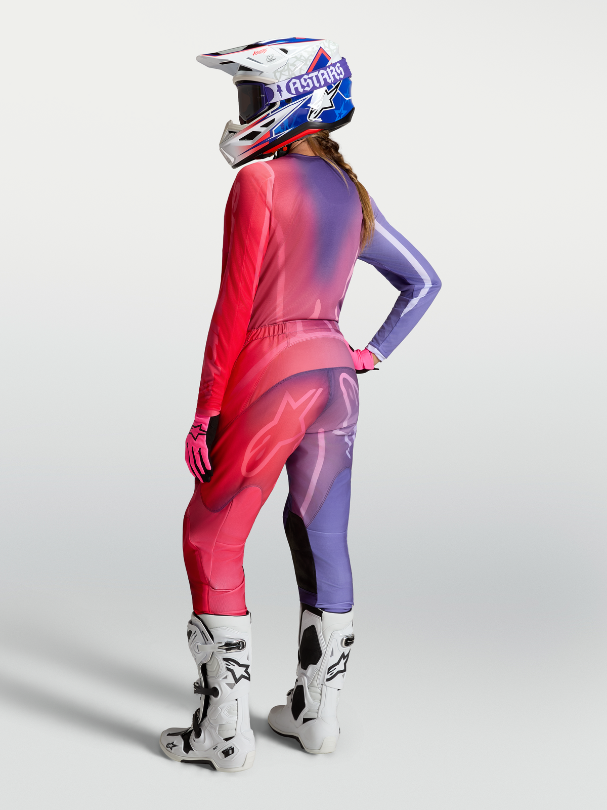 Alpinestars Stella Fluid Kepler Jersey, Women's Motocross Jersey, Purple and Rouge Red, shown with matching pants and boots.