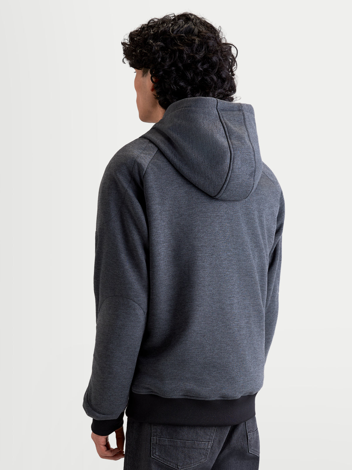 Alpinestars Ageless Hoodie, men's urban motorcycle hoodie, asphalt melange gray, back view of a model wearing the protective riding jacket with fixed hood and reinforced panels