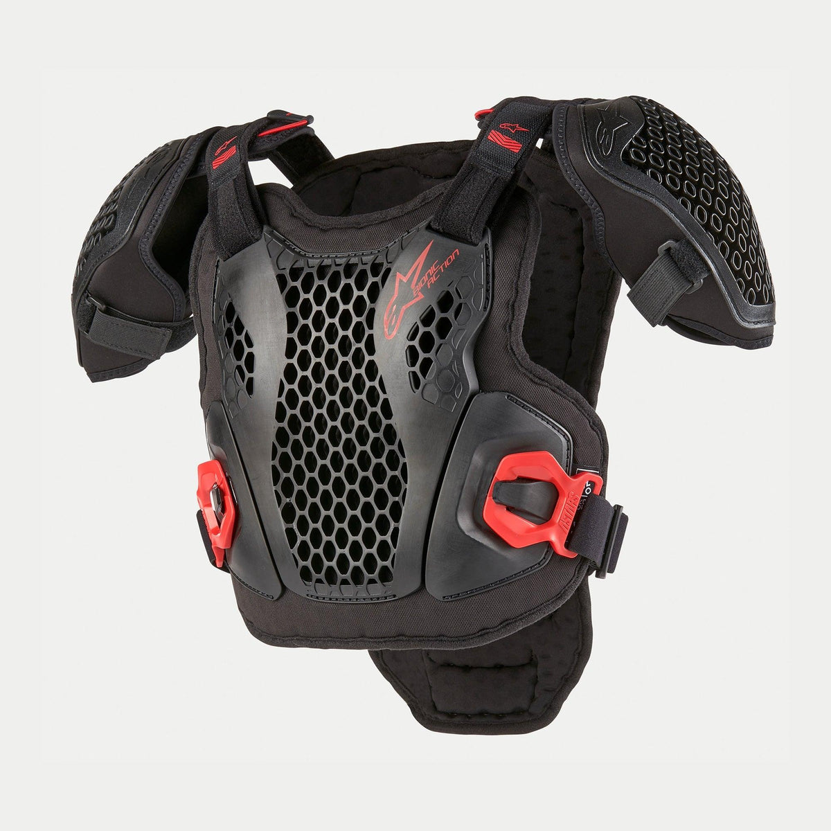 Alpinestars Bionic Action bröstskydd för ungdomar, motocross-kroppsskydd, svart och röd, med perforerade Cell Technology-gallerplattor, justerbara axelremmar, röda snabbspännen och vadderad konstruktion för terrängkörning