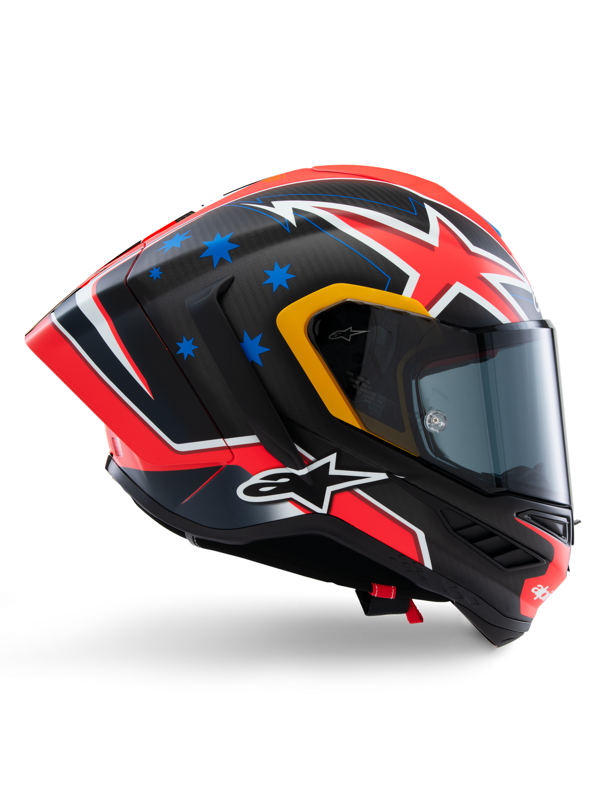 Alpinestars Supertech R10 Miller Limited Edition hjälm, racinghjälm, matt kolfiber med röd, vit och blå grafik, blå stjärndetaljer och gul visirkant, aerodynamisk profil med mörkt rökfärgat visir, högpresterande säkerhetsutrustning för motorcykel