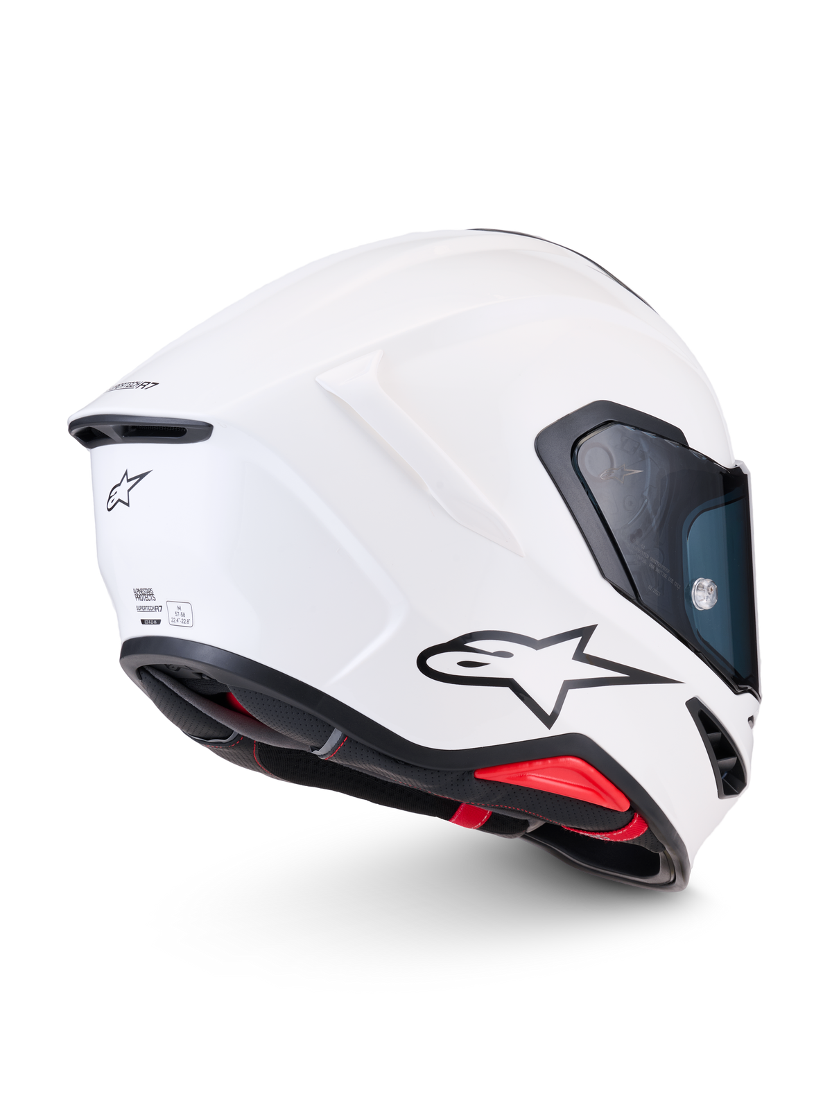 Alpinestars S-R7 Solid hjälm ECE 22.06, vit glansig helhjälm för motorcykelracing, sidobakprofil med aerodynamiskt kolfiberskal, svart A-star logotyp och certifieringsdetaljer