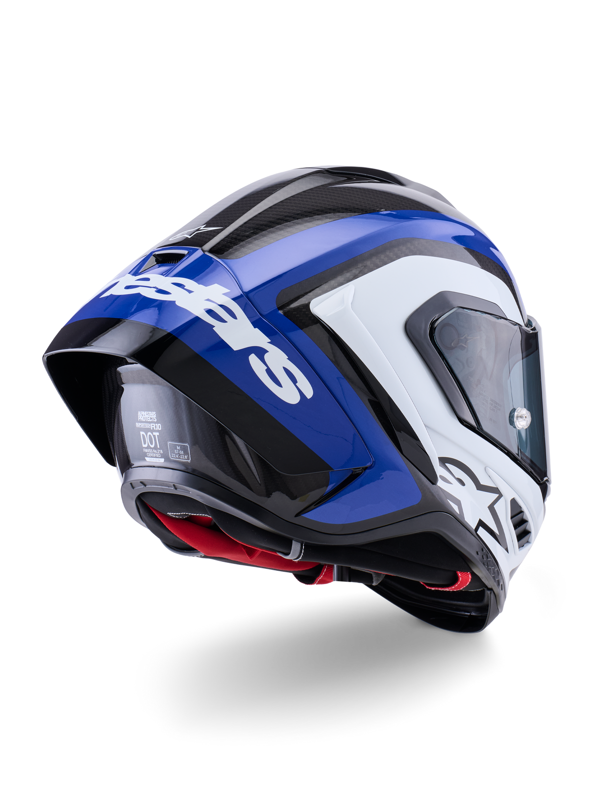 Alpinestars Supertech R10 Arius-hjälm, integralhjälm för racing, svart, vit och blå glansig yta, trekvartsvy bakifrån som visar den aerodynamiska spoilern, synlig kolfibertextur och framträdande vit Alpinestars-branding