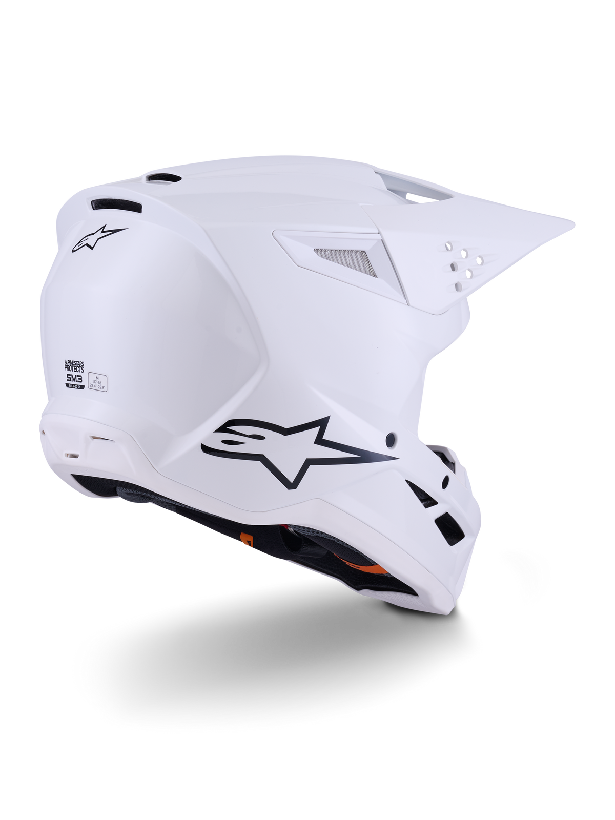 Alpinestars S-M3 Solid Helmet, Motocross Helmet, White Glossy, rear three-quarter view showing black Alpinestars logo, ventilation ports, and aerodynamic shell design for off-road racing.