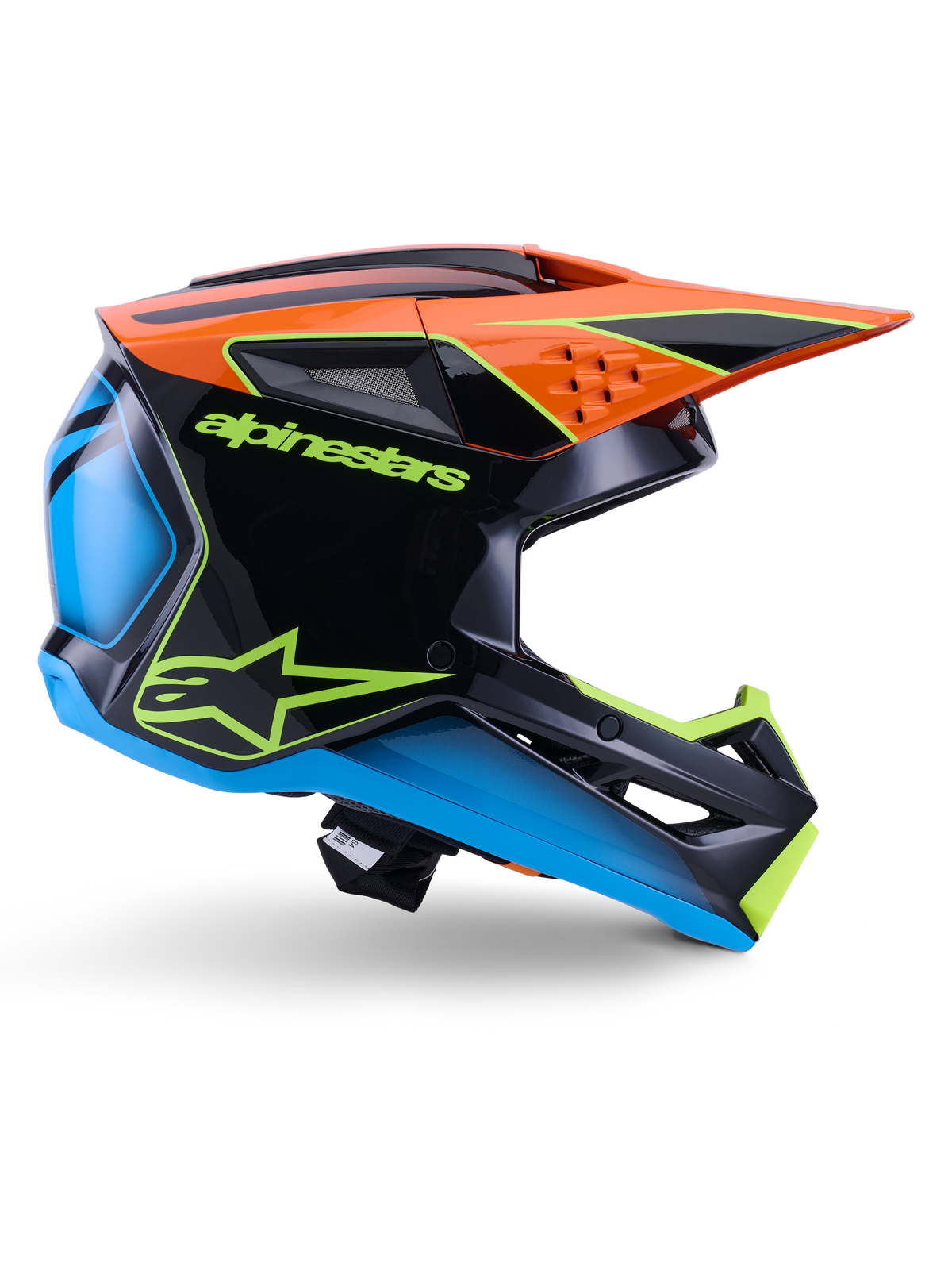 Alpinestars S-M3 Fray-hjälm ECE 22.06, motocrosshjälm, svart, orange, blå och neongul, sidoprofil av ett glansigt aerodynamiskt skal med en framträdande orange skärm, neongrön logotyp och blå accenter, skydd för terrängkörning