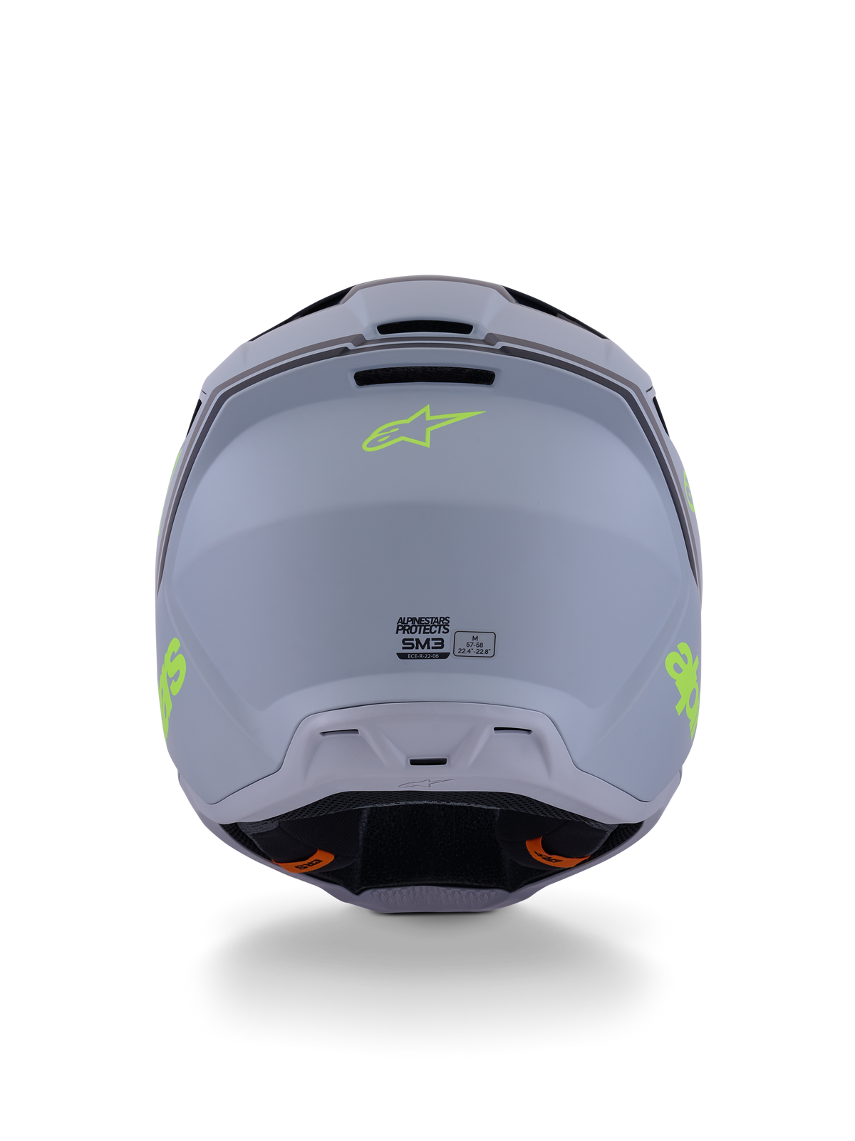 Alpinestars S-M3 Radium hjälm, motocrosshjälm, grön, svart och neongul matt, vy bakifrån som visar matt yta på skalet, neongul Alpinestars-logotyp och detaljer för ECE 22.06-certifiering.