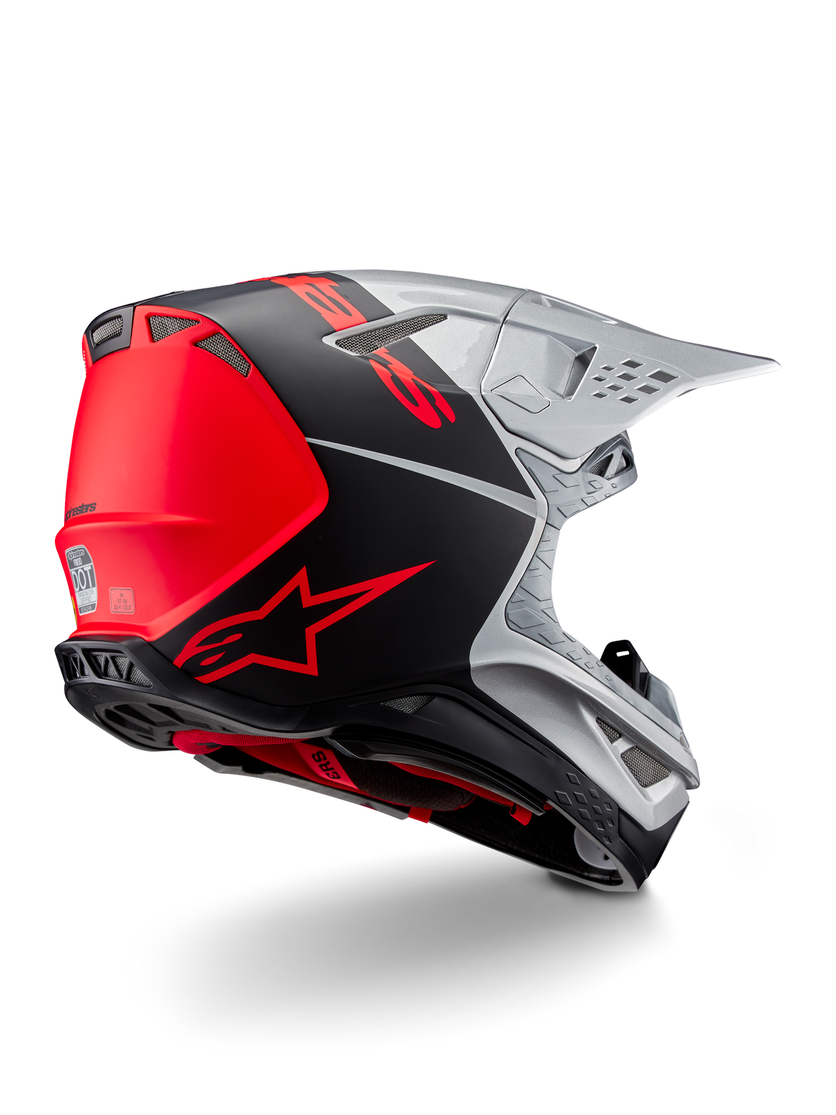 Alpinestars Supertech M10 Flood ECE 22.06-hjälm, motocrosshjälm, silver, svart och orange fluo, vy snett bakifrån som framhäver aerodynamisk skaldesign, ventilationsöppningar och en matt-glansig finish