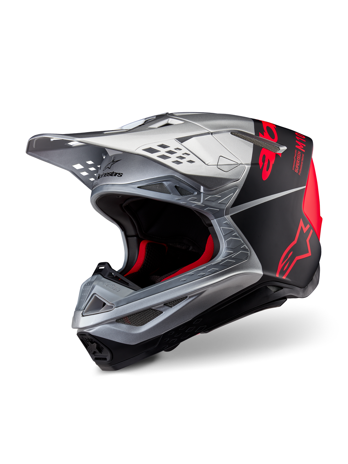 Alpinestars Supertech M10 Flood ECE 22.06-hjälm, motocrosshjälm, silver, svart och orange fluo, matt och glansig finish, med ett stilrent kolfiberskal, framträdande Alpinestars-logotyp och flera ventilationsöppningar