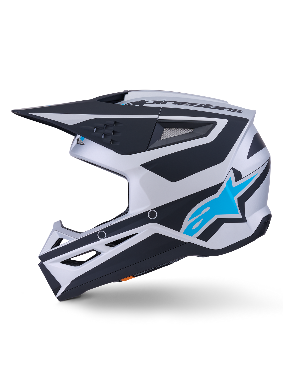 Alpinestars S-M3 Heat-hjälm ECE 22.06, motocrosshjälm, silver, blå och svart matt finish, sidoprofil, med en klarblå Alpinestars-stjärnlogotyp, svart visir och flera ventilationsportar, aggressiv aerodynamisk design för terrängkörning