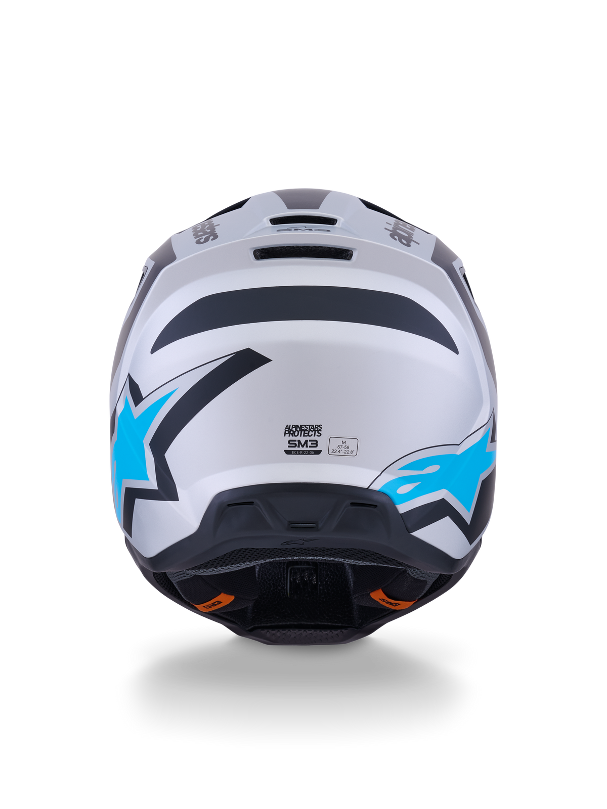 Alpinestars S-M3 Heat hjälm, motocrosshjälm, silver, blå och matt svart, vy bakifrån som visar klarblå stjärnlogotyper, matt finish och integrerade ventilationsportar.
