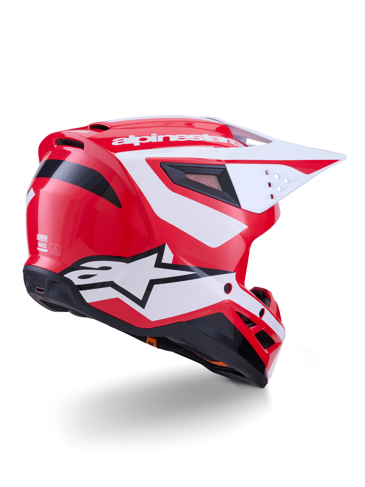 Alpinestars S-M3 Heat motocrosshjälm, röd, vit och svart blank, ECE 22.06-certifierad, vy snett bakifrån.