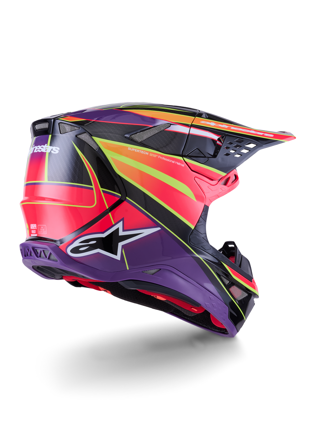 Alpinestars Supertech M10 Era hjälm, motocrosshjälm, rosa, violett och neongul blank, bakre trekvartsvy som visar det aerodynamiska kolfiberskalet, integrerade ventilationsöppningar och tydliga logotyper, högpresterande racingutrustning för terrängkörning