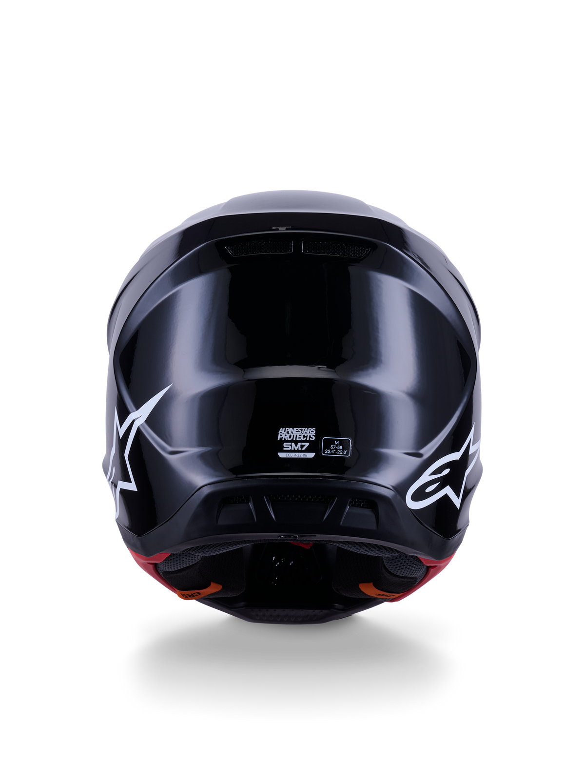 Alpinestars S-M7 Solid-hjälm ECE 22.06, motocrosshjälm, blanksvart, baksida med vita stjärnlogotyper, aerodynamiskt kompositskal med högblank yta, säkerhetscertifiering och storleksetiketter i mitten
