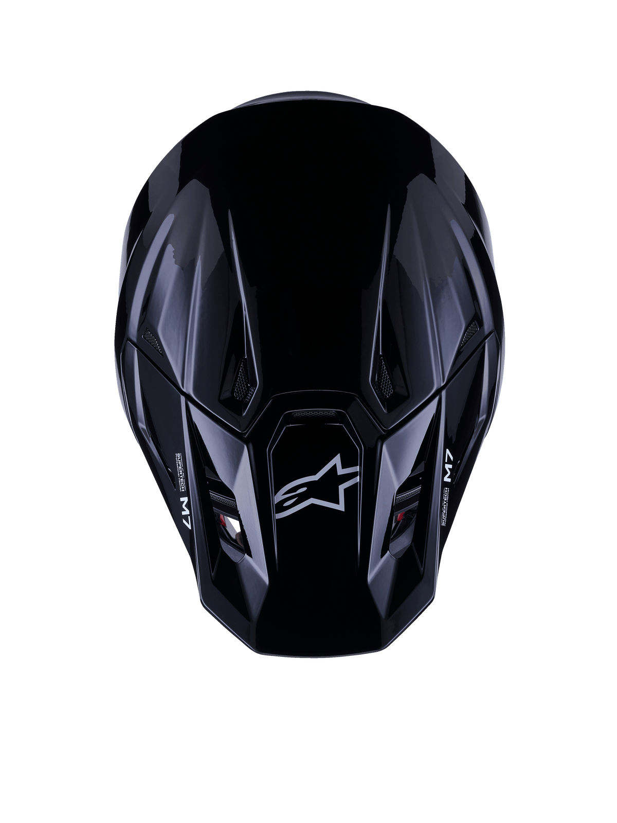 Alpinestars S-M7 Solid-hjälm ECE 22.06, motocrosshjälm, blanksvart, vy uppifrån som visar det aerodynamiska kompositskalet med Astars-logotyp och M7-branding, strömlinjeformad design med ventilationsöppningar för offroad-racingprestanda