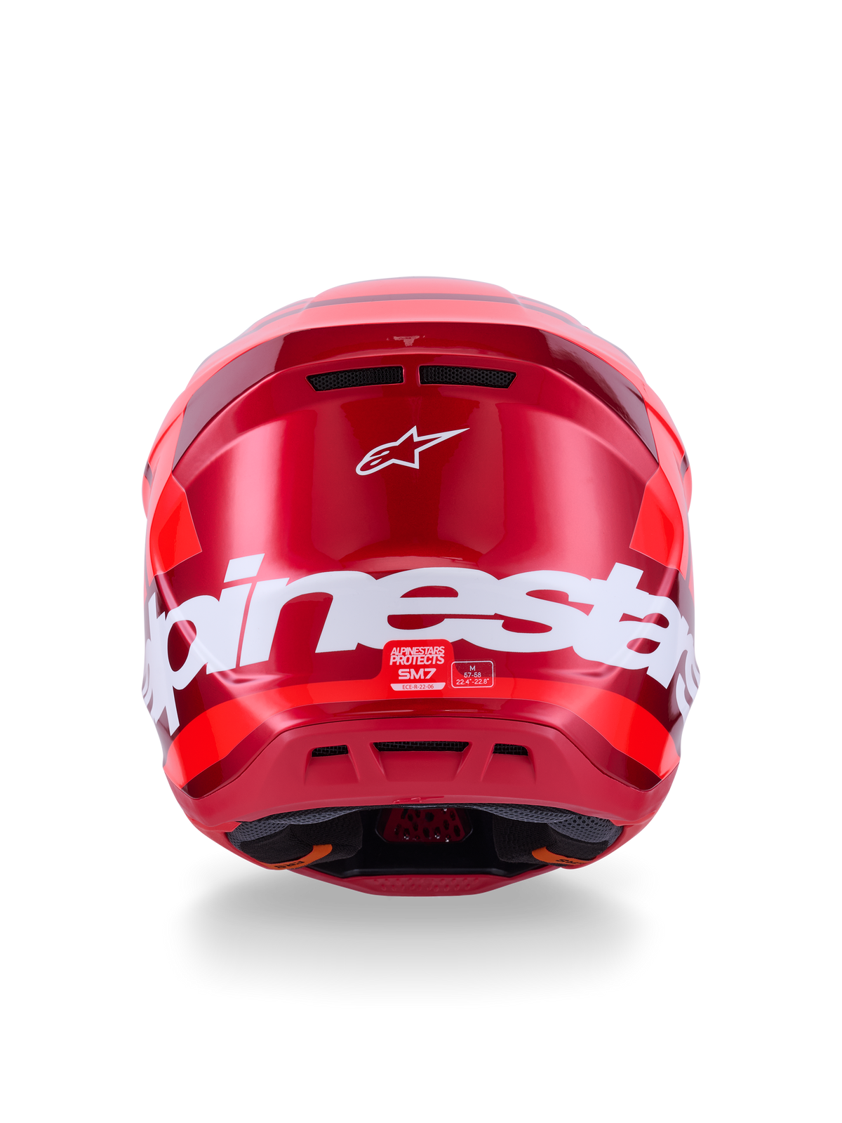 Alpinestars S-M7 Core-hjälm, röd glansig, sedd bakifrån med stor vit Alpinestars-logotyp, aerodynamiskt skal med integrerade ventilationsportar, professionellt huvudskydd för motocross