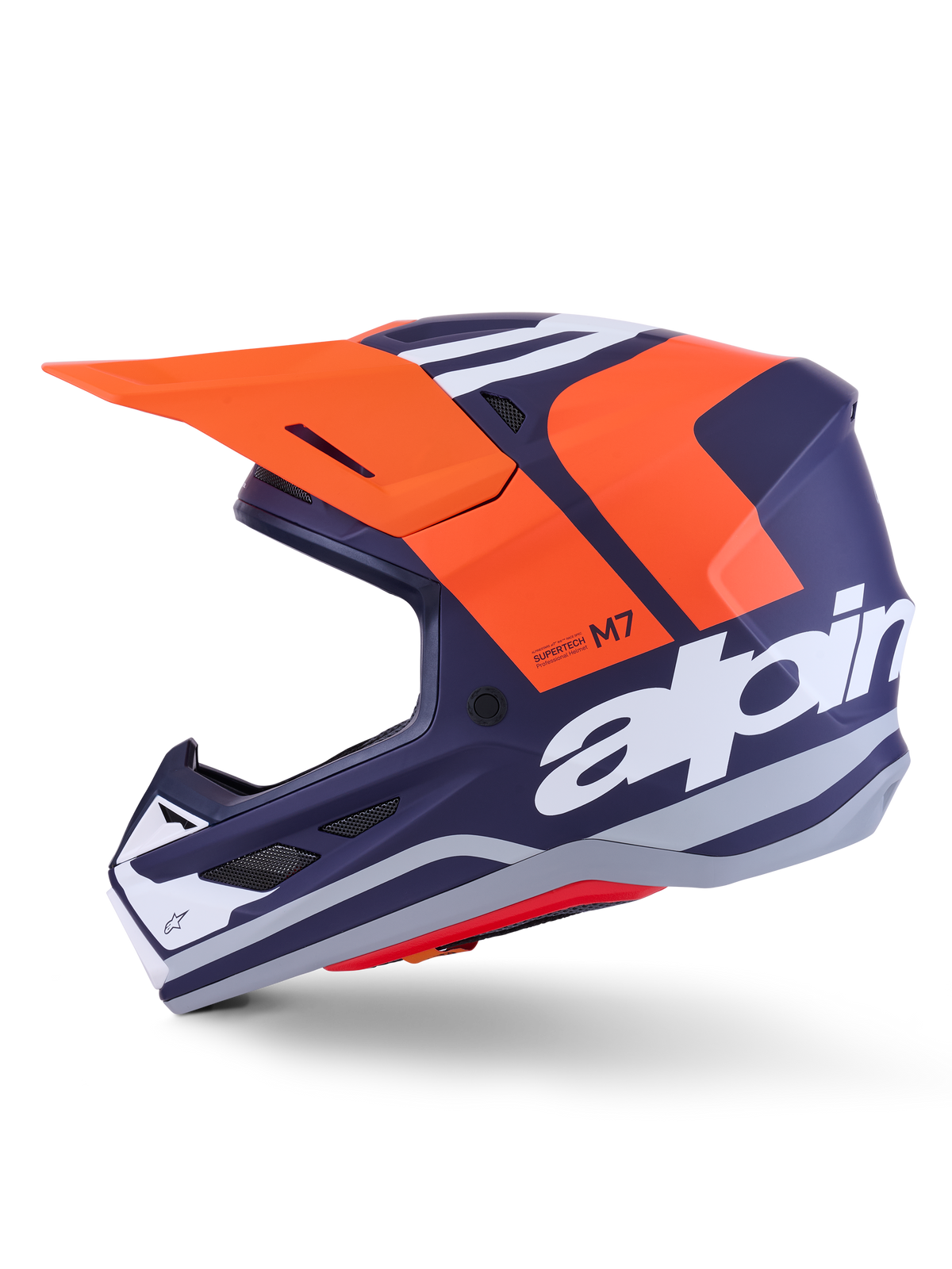 Alpinestars S-M7 Core-hjälm ECE 22.06, sidoprofil, marinblå och orange matt finish, stor vit logotyp på sidan, aerodynamisk motocrosshjälm med skyddande visir