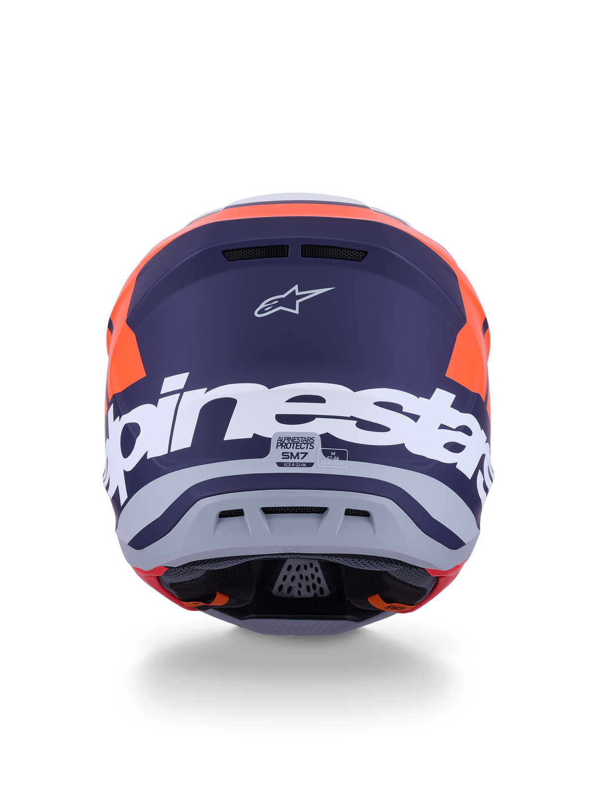 Alpinestars S-M7 Core hjälm ECE 22.06, motocrosshjälm, orange och blå matt, vy bakifrån med stor vit Alpinestars-text och Astars-logotyp, strömlinjeformad aerodynamisk design med integrerade ventilationsportar, professionellt skydd för terrängkörning