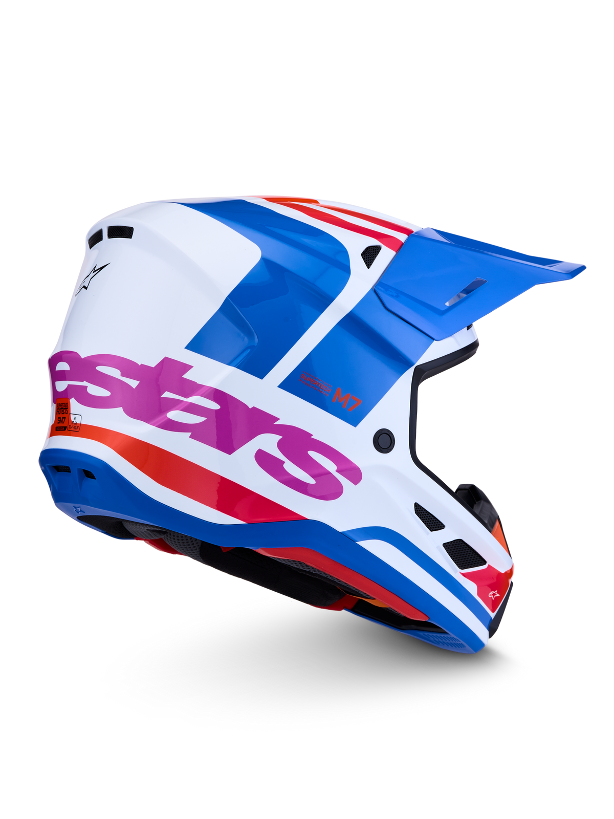 Alpinestars S-M7 Core hjälm ECE06, vit och blå motocrosshjälm med rosa och orange detaljer, ECE 22.06-certifierad.