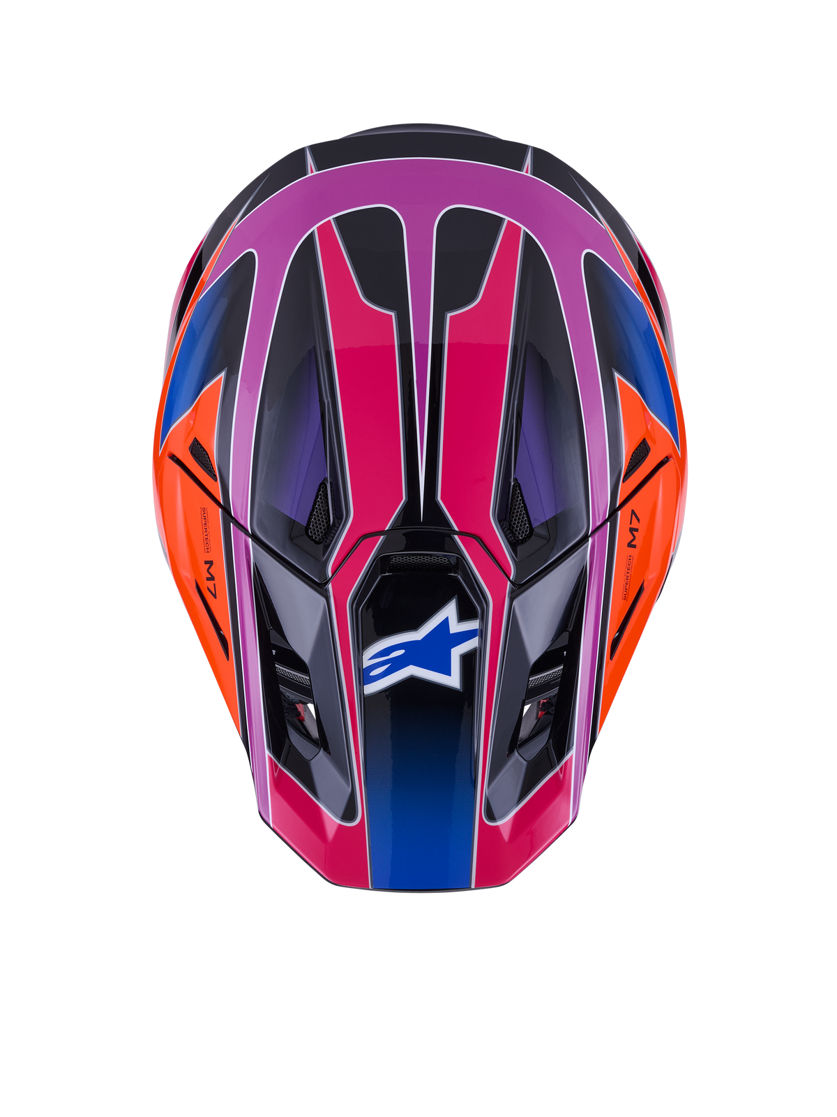 Alpinestars S-M7 Fuse-hjälm, sedd ovanifrån, glansig blå, lila och rosa med orangea och svarta detaljer, livfull geometrisk design, aerodynamiskt skal med ventilationsöppningar och Alpinestars-logotyp på visiret, motocross-skyddsutrustning