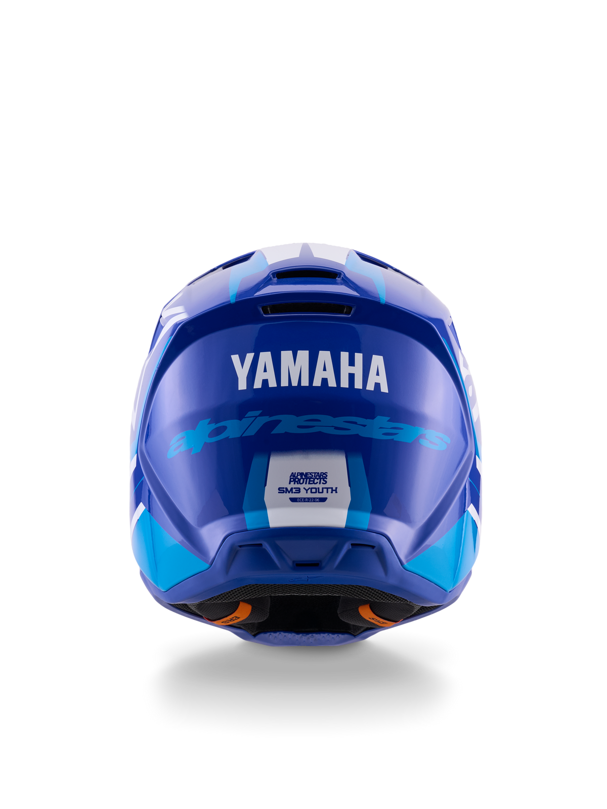 Yamaha S-M3 Youth Motocross Helmet, Rear view, Blue and White Glossy, featuring prominent Yamaha and Alpinestars branding, aerodynamic shell design with ECE 22.06 safety certification label, professional head protection for off-road racing