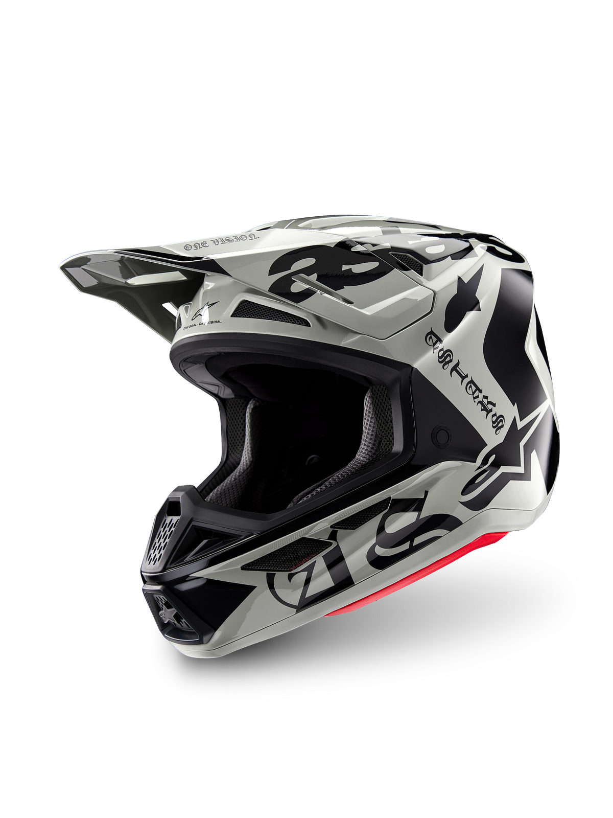 Alpinestars Limited Edition S-M7 Wolf Dust-hjälm, motocrosshjälm, Dune Black Glossy, ljusgrått skal med svarta gotiska 'ASTARS'-bokstäver och stjärnlogotyp, röd accent på den nedre kanten, utrustad med ett högpresterande visir och flera luftintag, trefjärdedels vy framifrån
