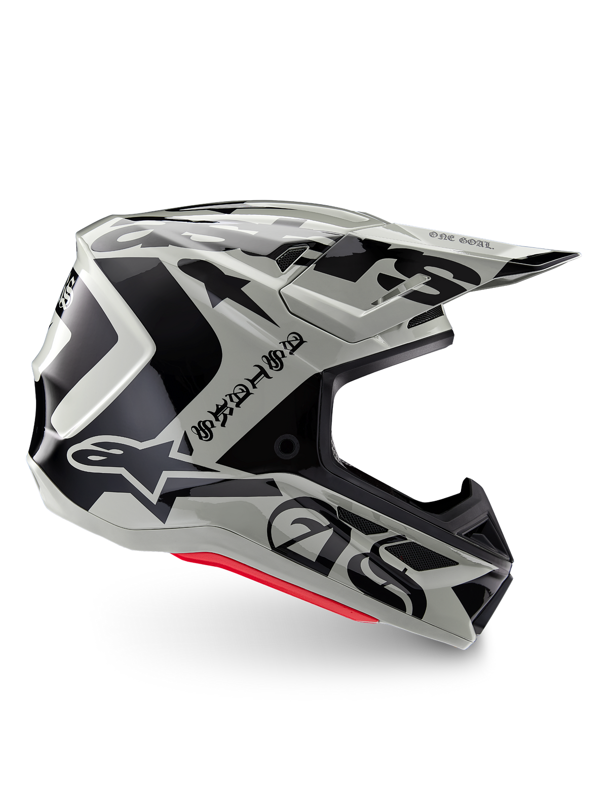 Alpinestars Limited Edition S-M7 Wolf Dust-hjälm, motocrosshjälm i Dune Black Glossy, sidoprofil med djärv svart grafik och logotyper, röda accenter nertill, aerodynamiskt huvudskydd för terrängkörning