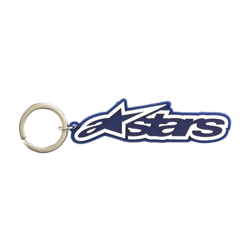 Alpinestars Blaze nyckelring, motorsport-inspirerad nyckelring, blå och vit, 3D-gummikonstruktion med signaturlogotyp och metallsnapring