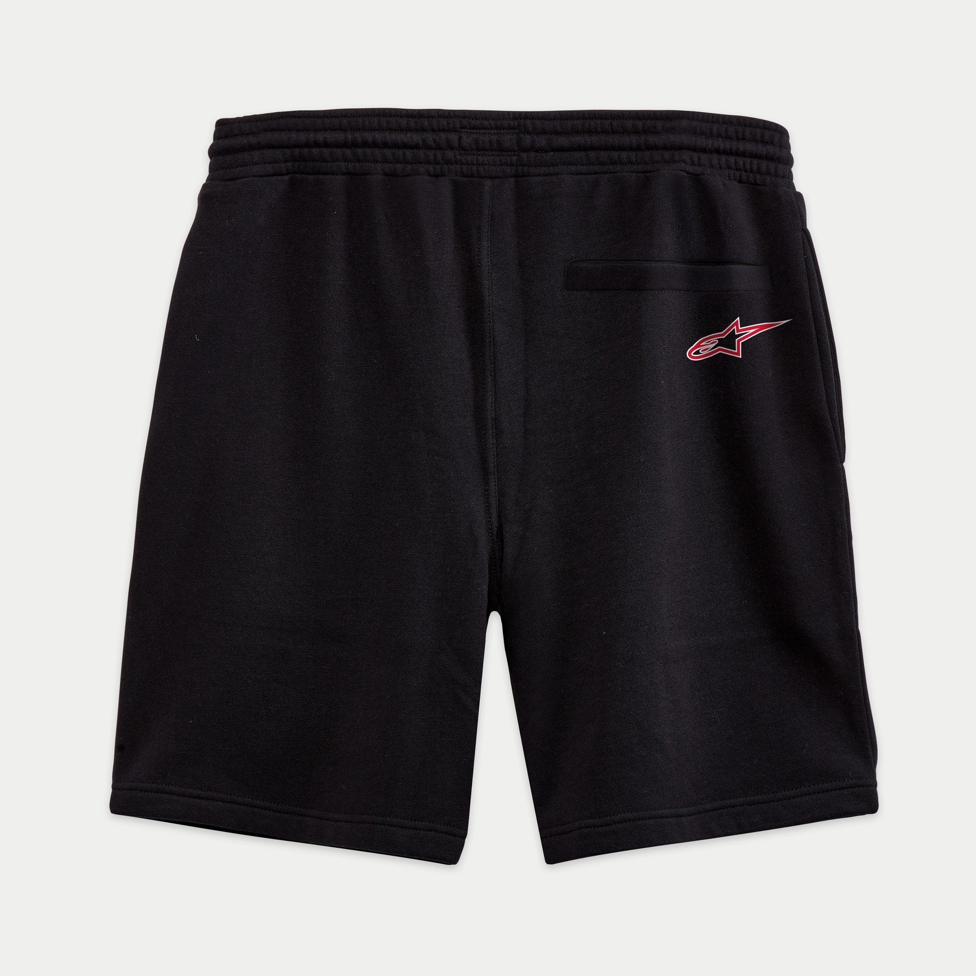 Alpinestars Dunker Short, svarta träningsshorts i fleece sett bakifrån, bakficka med passpoal, röd och vit Ageless-stjärnlogotyp på bakhöften, elastisk midja, bekväm passform