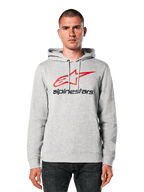 Alpinestars Always V3 Hoodie, ljusgrå melerad med röd och svart stjärnlogotyp, bärs av en modell, vardaglig streetwear, huva med dragsko, känguruficka fram, design med motorsportarv