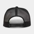 Alpinestars Ride 4.0 Camo Trucker Hat, svart, baksida som visar ventilerande nätkrona och justerbar snapback-rem i plast med en liten logotypetikett, vardaglig motorsportinspirerad huvudbonad.