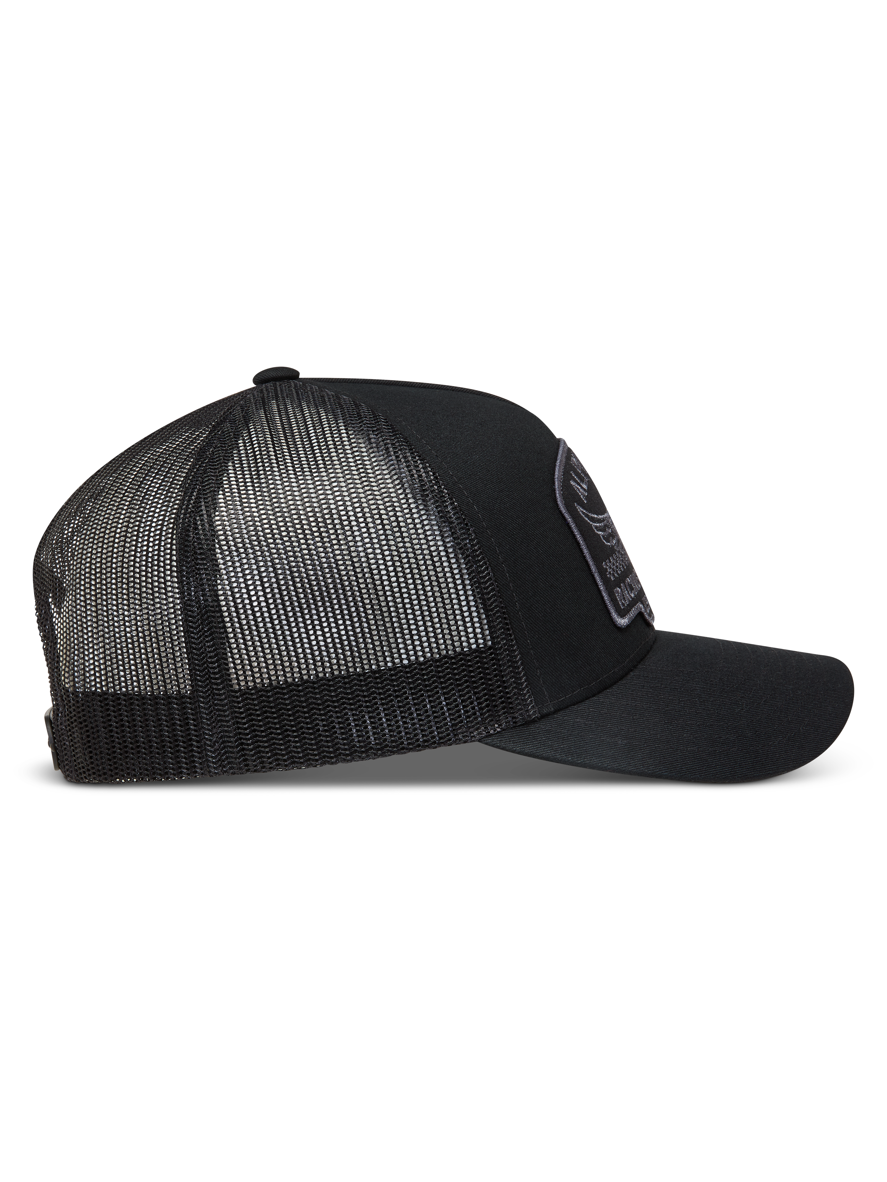 Alpinestars Heritage Patch Trucker keps, svart och grå keps i sidovy med böjd skärm och ventilerande meshbaksida