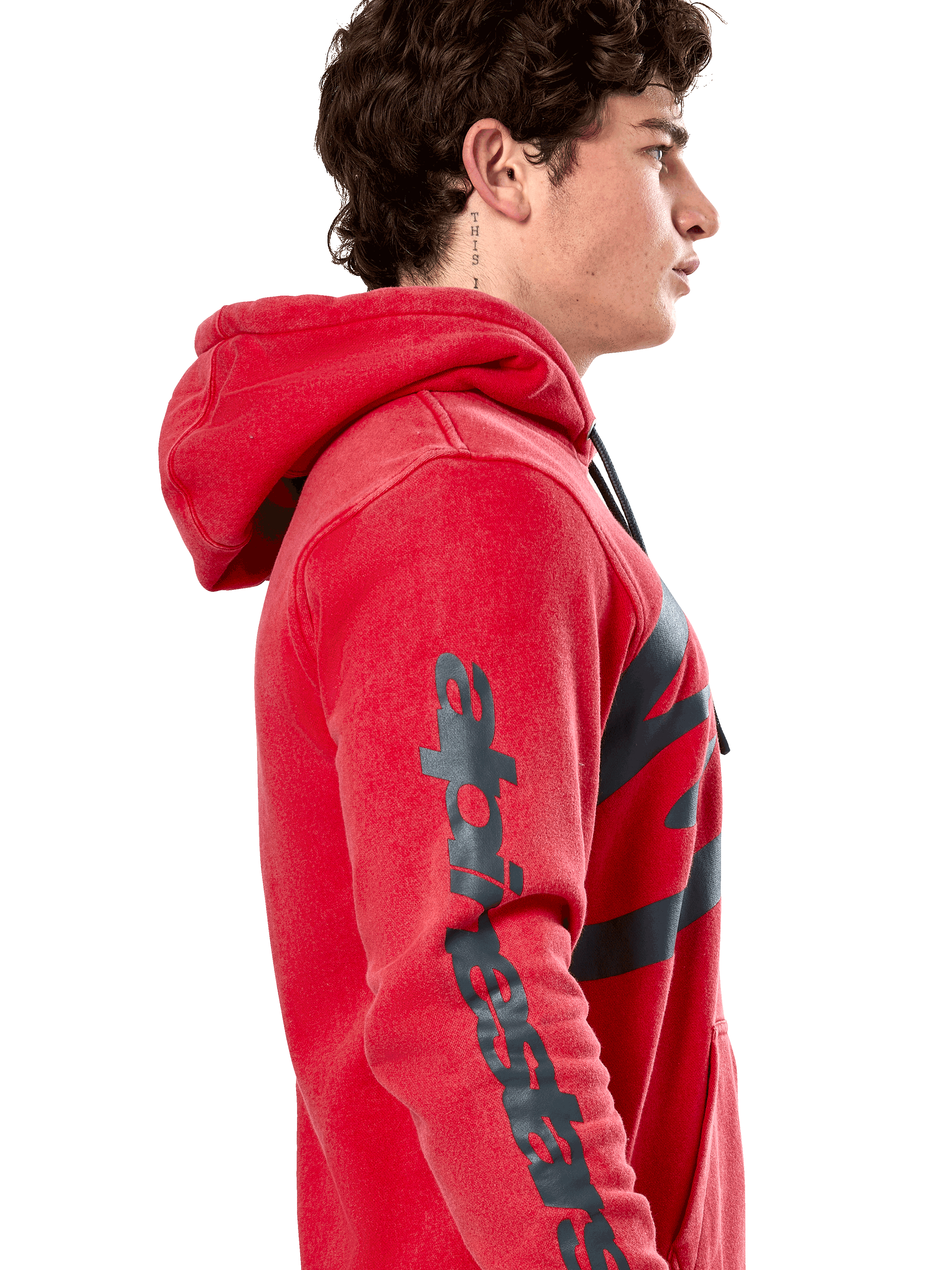 Alpinestars Unbound Hoodie, Red pullover fleece hoodie, side profile showing dark gray Alpinestars wordmark on the sleeve, garment-dyed finish with a drawstring hood, casual motorsport streetwear