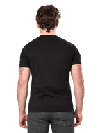 Alpinestars Semicircle CSF Tee, kortärmad t-shirt, svart, baksida på modell, enfärgad baksida, avslappnat motorsport-streetwear, stylad med mörkgrå jeans
