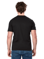 Alpinestars Cereal CSF Tee, kortärmad T-shirt, svart, sedd bakifrån, bärs med blå jeans, avslappnad motorsportinspirerad streetwear