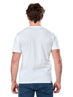 Alpinestars Dot Carbon Csf Tee, kortärmad t-shirt, vit, sedd bakifrån på modell, bärs med blå denimjeans, casual motorsport streetwear