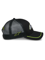 Alpinestars Exceed Trucker-keps, profilvy, svart med limegröna detaljer, bakpaneler i mesh, böjd skärm med limegrön sutasjkant, broderad logotyp på sidan, casual motorsport-huvudbonad