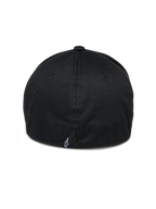 Alpinestars Cereal Hat, svart baseballkeps, vy bakifrån med flexibelt bakstycke och en liten vit broderad logotyp nertill, vardaglig sportkeps