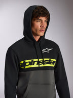 Alpinestars Parallel Hoodie, casual color-blocked streetwear, black top and gunmetal grey bottom, neon yellow chest band with black Alpinestars word logo, white Astars logo, hooded pullover with drawstring