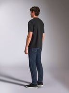 Alpinestars Aplomb Oversized CSF Tee, kortärmad t-shirt, svart, bakifrån på modell, casual motorsport-inspirerad streetwear, avslappnad oversized passform