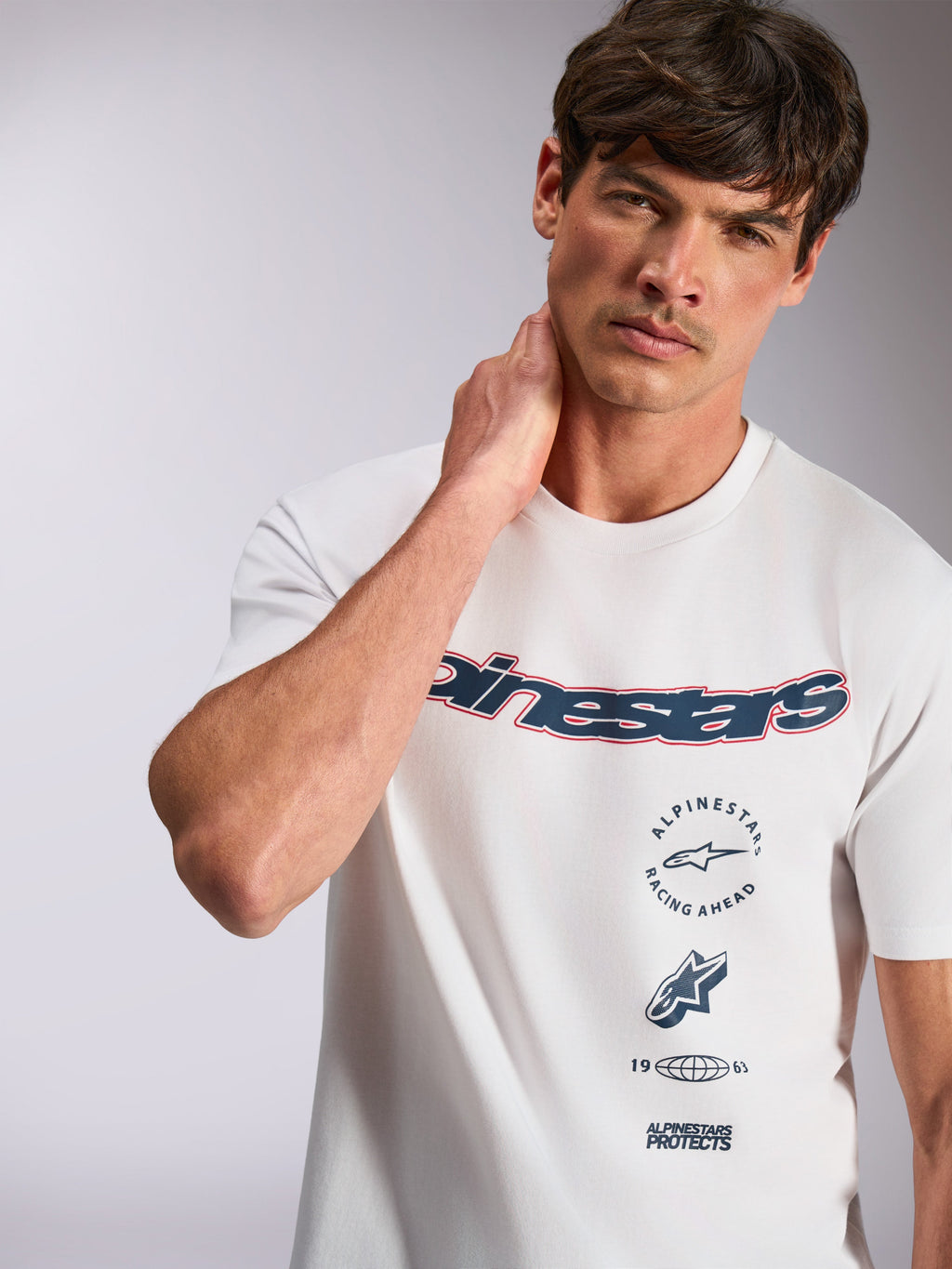 Alpinestars Abus CSF Tee, Short Sleeve T-Shirt, White, featuring navy Alpinestars curved logo with red outline and multi-stacked graphics, casual motorsport streetwear
