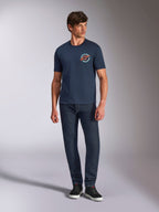 Alpinestars Aorbit CSF Tee, Short Sleeve T-Shirt, Navy, circular chest graphic with Always Fast Made to Last text, worn with dark jeans and sneakers, casual motorsport lifestyle wear