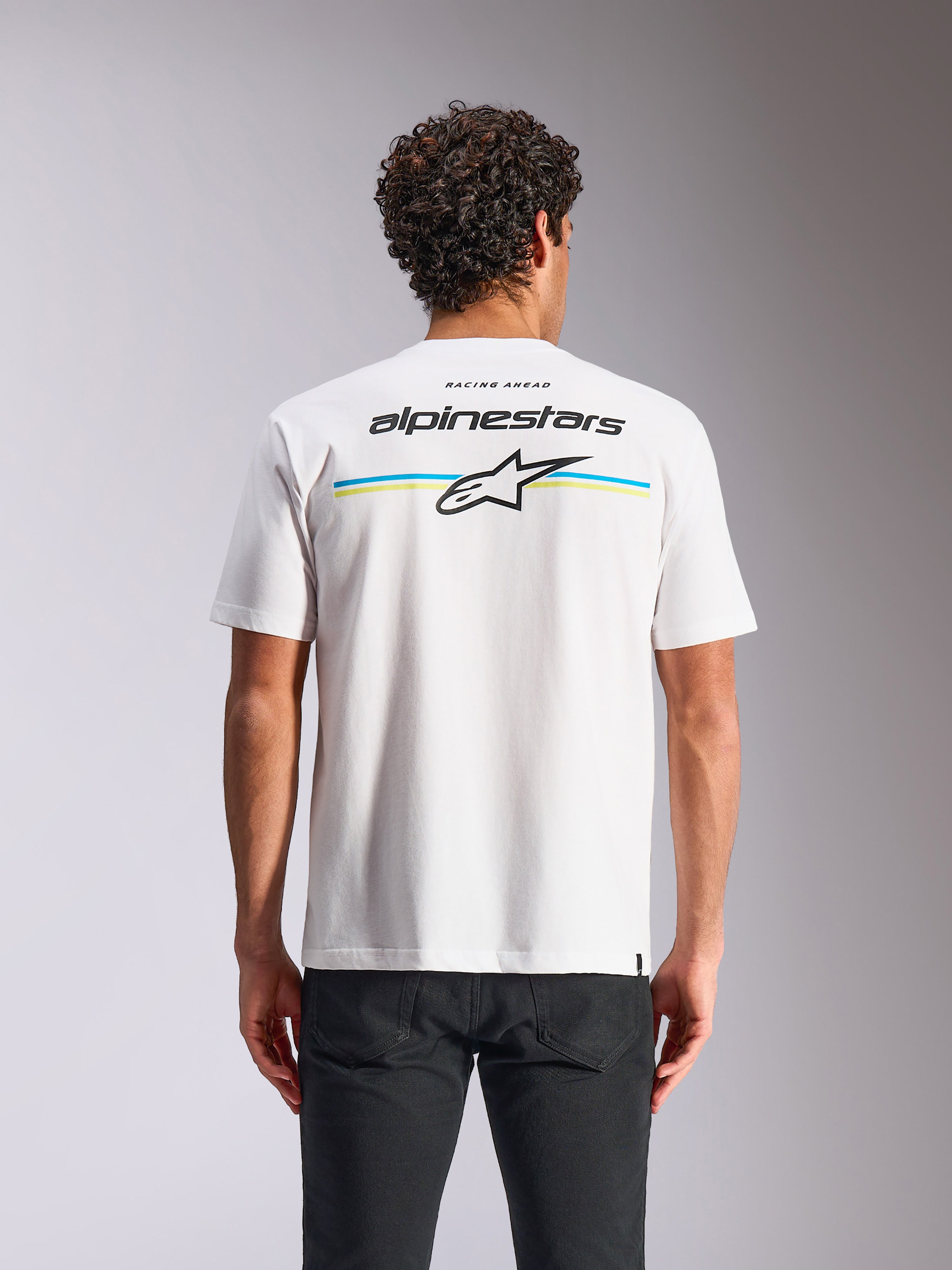 Alpinestars Lanes CSF Tee, kortärmad t-shirt, vit, ryggvy med flerfärgade ränder samt Alpinestars- och Astars-logotyper, avslappnad motorsport-streetwear