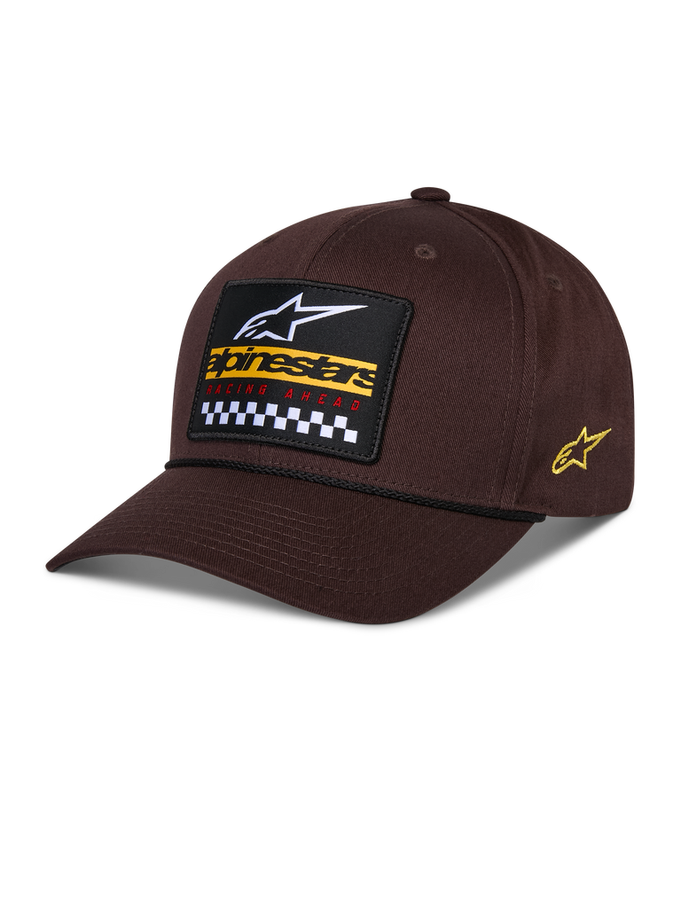 Alpinestars Matrix Snapback keps, brun, med ett broderat märke framtill med vit logotyp, gul märkning och schackrutigt mönster, Astars-logotyp på sidan, böjd skärm, casual sportswear