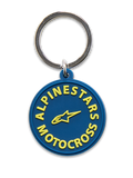 Alpinestars MX nyckelring, marinblå med gult, 3D-formad cirkulär design med gul Alpinestars Motocross-text och stjärnlogotyp, silverfärgad metallsnäppring, motorsport-inspirerad accessoar